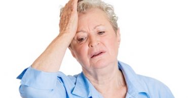 Duh moment. Old woman with hand on head, realization of mistake