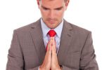business man praying